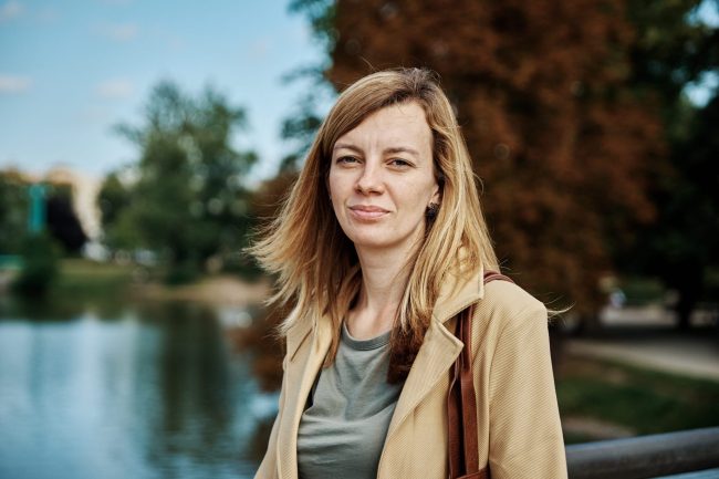 Portrait of beautiful caucasian woman looking in the city street